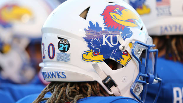 Dec 28, 2022; Memphis, TN, USA; A detail view of a helmet sticker honoring Kansas Jayhawks former player John Had (21) is seen prior to the 2022 Liberty Bowl against the Arkansas Razorbacks at Liberty Bowl Memorial Stadium. Mandatory Credit: Nelson Chenault-USA TODAY Sports